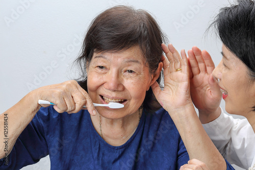 Asian seniors woman <b>hearing loss</b> , Hard of hearing - 500_F_125581434_qS0ViNuiumbkrA6U2ZX7iTy01krM3IRj