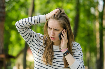 Young woman using her phone