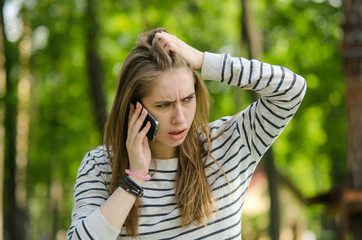 Young woman using her phone
