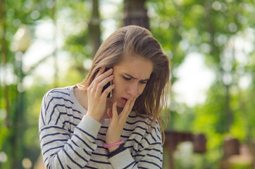 Young woman using her phone