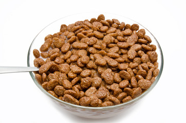 Chocolate cereal balls this milk in the bowl