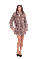 Full length portrait of beautiful brunette women in short mink c