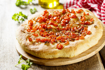 Focaccia bread with tomatoes and garlic