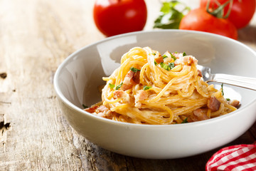Tomato pasta with egg sauce, cheese and ham