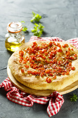 Focaccia bread with tomatoes and garlic