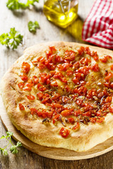 Focaccia bread with tomatoes and garlic