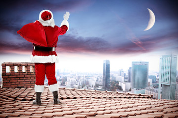 Fototapeta premium santa claus on roof 