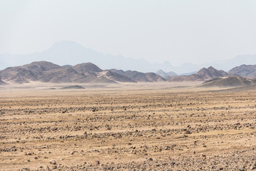 Fototapeta na wymiar In the sandy arabic desert in egypt, Hurghada