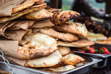 Lavash, Bakery Products fresh pastry sells pita market wheat tortillas close-up Caucasian kitchen...