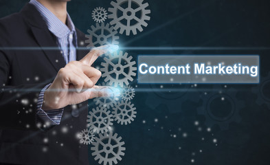 Businessman hand select wording content marketing. sign on virtual screen. business concept.
