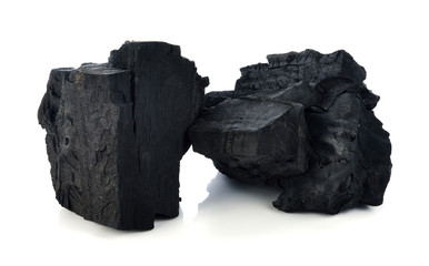 Obraz premium Hardwood charcoal isolated on white.