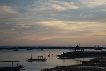 Fishing boat silhouette in seaside