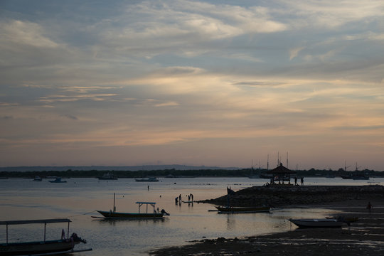 Fishing boat silhouette in seaside © HADI