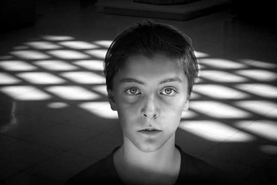 Black And White Portrait Of A Teenage Boy