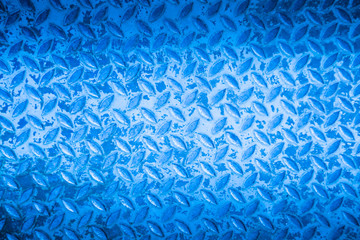 Blue metal non slip surface background.