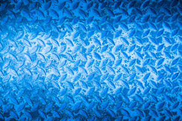 Blue metal non slip surface background.