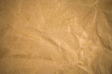 Naklejka premium Crumpled brown recycle paper background.