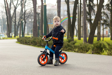 Little boy on the run bike