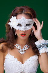 Cute woman in masquerade mask