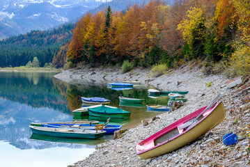 row boats at the sylvensteinspeicher lake in germany