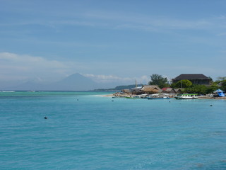 Fototapeta na wymiar Beautiful tropical sandy beach on Gili Island. Indonesia