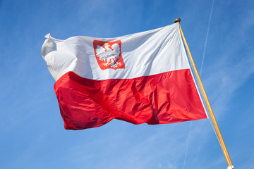 Obraz na płótnie Canvas Polish national flag in the sky.