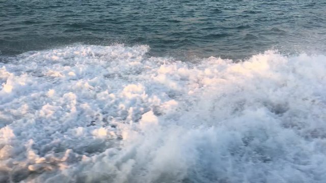 Passenger Boat is running on shock waves against the boat