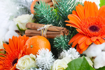 Christmas background with fresh flowers and fruit, close-up