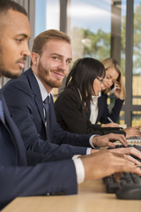Portrait of young coworker at office