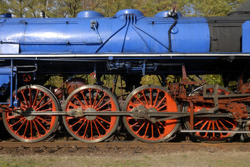 Fototapeta na wymiar Steam locomotive wheels close up