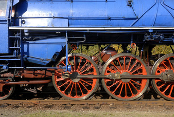 Fototapeta na wymiar Steam locomotive wheels close up