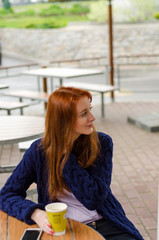 Young woman using her cell phone 