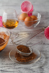 eggs, flour and rolling pin on wooden table