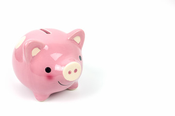 Pink piggy bank on white background