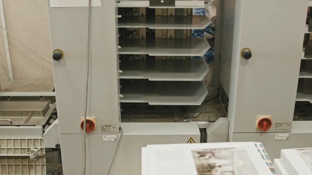 Polygraph process inside - folding machine on printing industry, slider