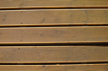 Wooden planks made wall, close up surface background