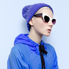 Hipster girl in stylish blue clothes.Autumn Winter fashion