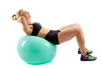 Fitness girl working with gym ball