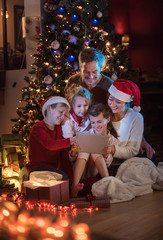 At christmas a lovely family find a digital tablet in their gift