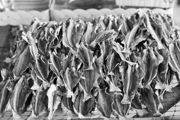 Dried fish on the grill to sell in the market