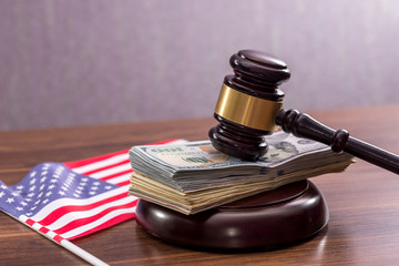 dollar, hammer and us flag