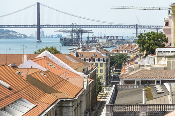 Obraz premium Above the roofs of Lisbon city in Portugal