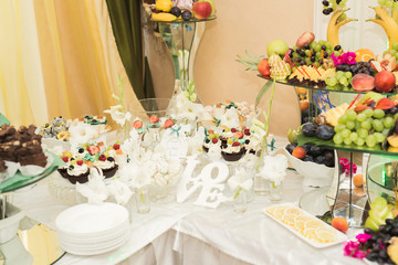 Different kinds of baked sweets on a buffet