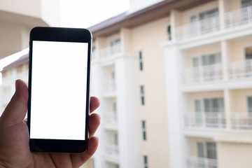 A Hand of fat guy uses a smartphone.