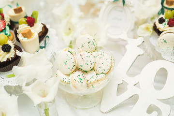 French sweet colorful macarons background, close up