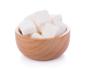 sugar cube in wooden bowl on white background