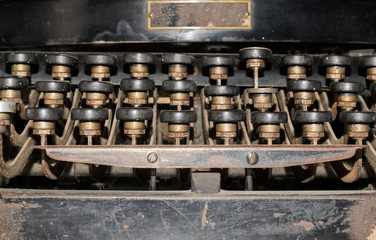 old rusty typewriter close up photo, vintage typewriting,empty plate