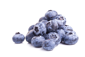 close up of blueberries on white background