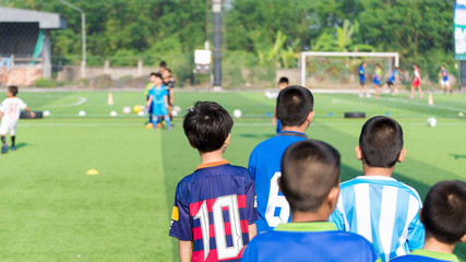 Fototapeta premium Children Training in Soccer academy