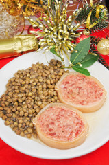 Italian cotechino with lentils on Christmas table